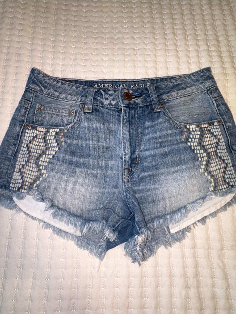 American Eagle Outfitters Light Wash Denim Shorts with Sequin Accents